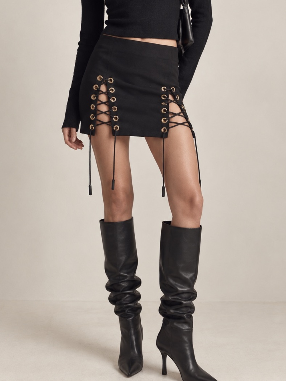 Are you am I black eyelet lace up meli mini skirt